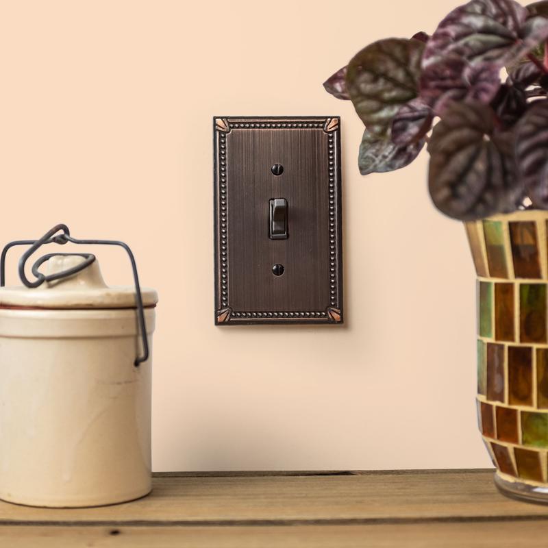 Amerelle Imperial Bead Aged Bronze 2 gang Die-Cast Metal Toggle Wall Plate