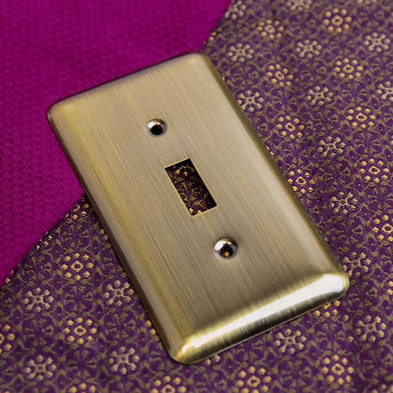 Amerelle Devon Brushed Brass 2 gang Stamped Steel Decorator/Toggle Wall Plate