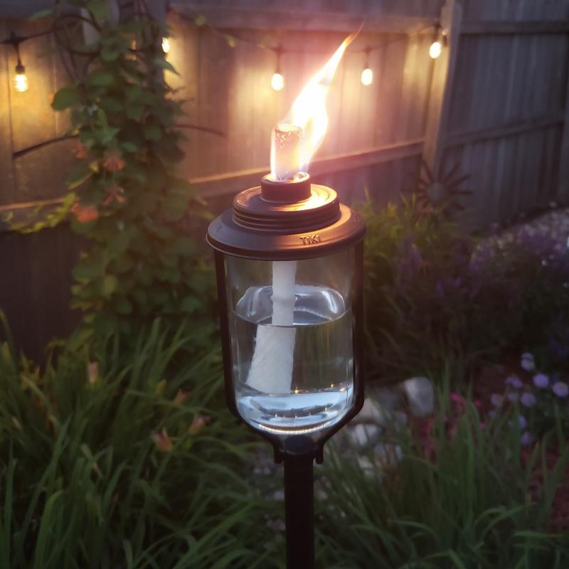 TIKI Convertible Black/Clear Glass/Metal 65 in. Tiki Outdoor Torch