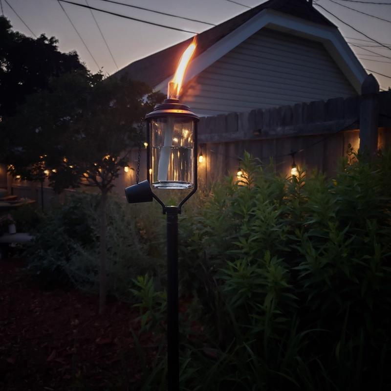 TIKI Convertible Black/Clear Glass/Metal 65 in. Tiki Outdoor Torch