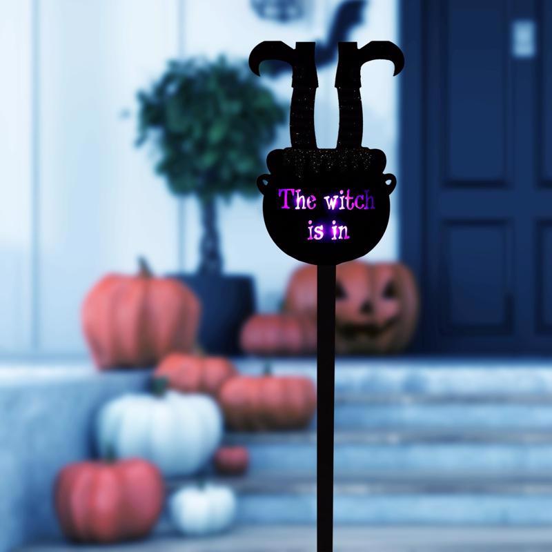 Alpine 36 in. LED Prelit Witch Legs Light Stake Yard Decor