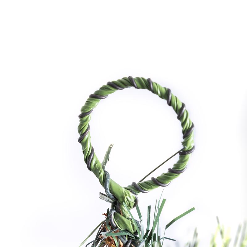 Celebrations 12 in. D X 9 ft. L LED Prelit Twig Pine Bow Garland