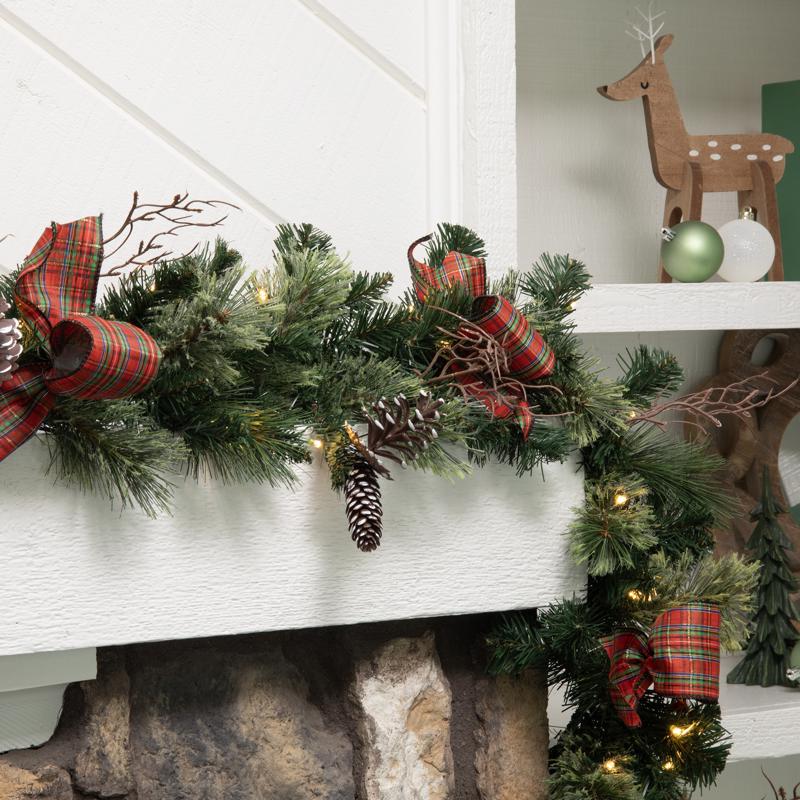 Celebrations 12 in. D X 9 ft. L LED Prelit Twig Pine Bow Garland