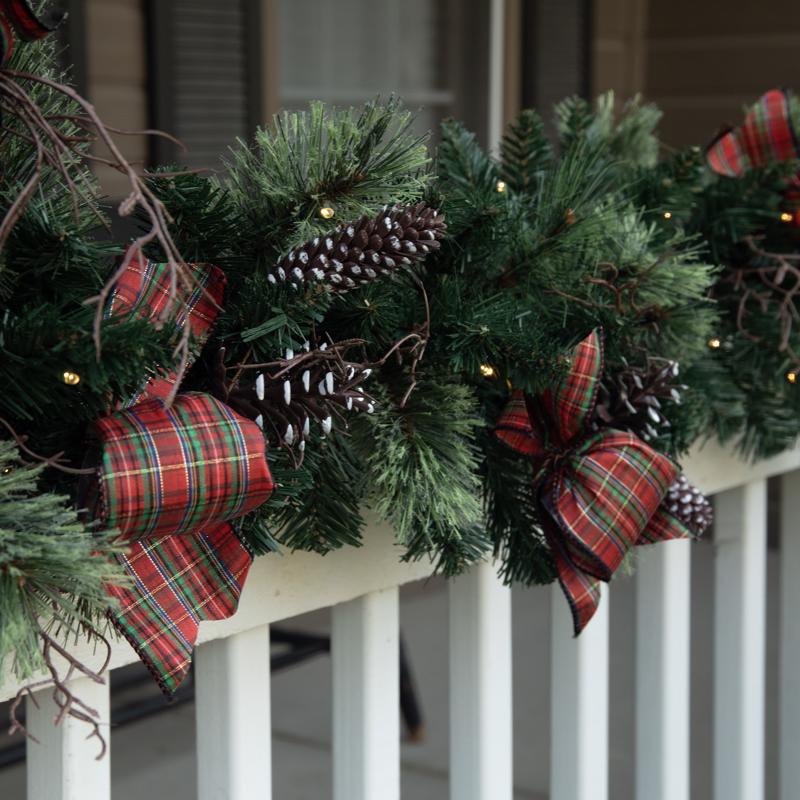 Celebrations 12 in. D X 9 ft. L LED Prelit Twig Pine Bow Garland